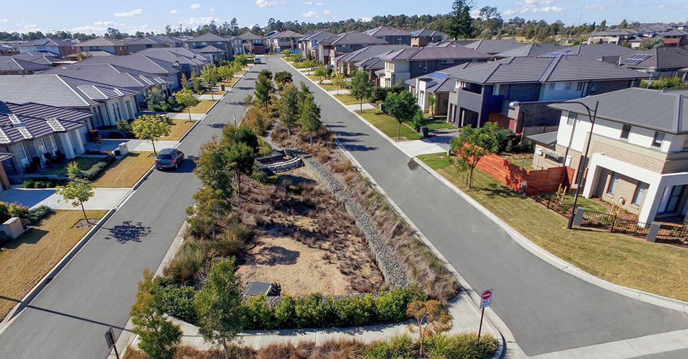 A drone shot of a housing suburb.