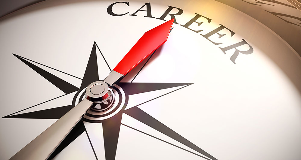 A compass with a red arrow points to the word "career"