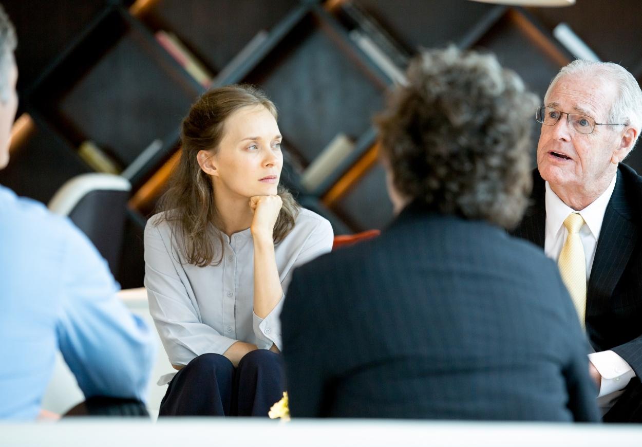 Group of people mid discussion