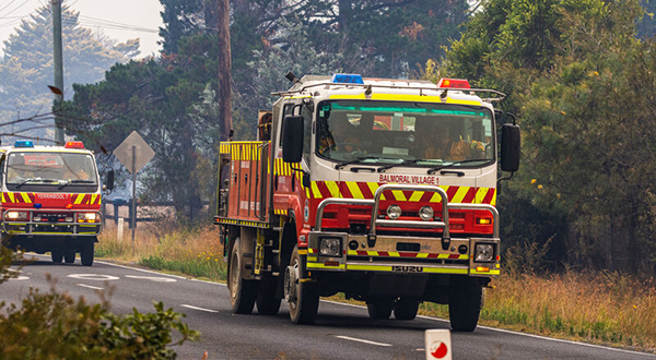 Fire trucks on the way to fight a bushfire.