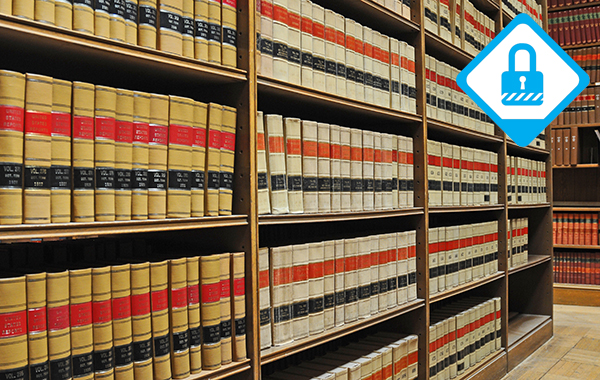 Legal volumes on shelves in a library.